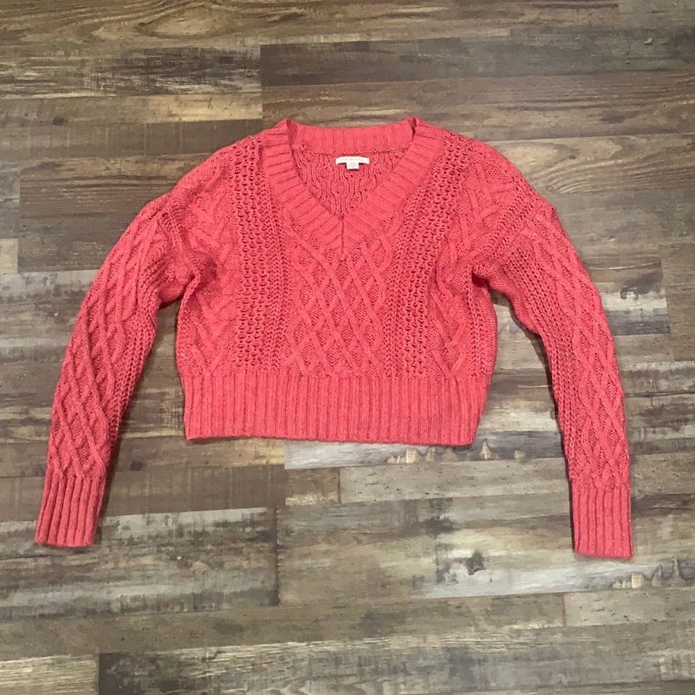 Pink cropped knit sweater